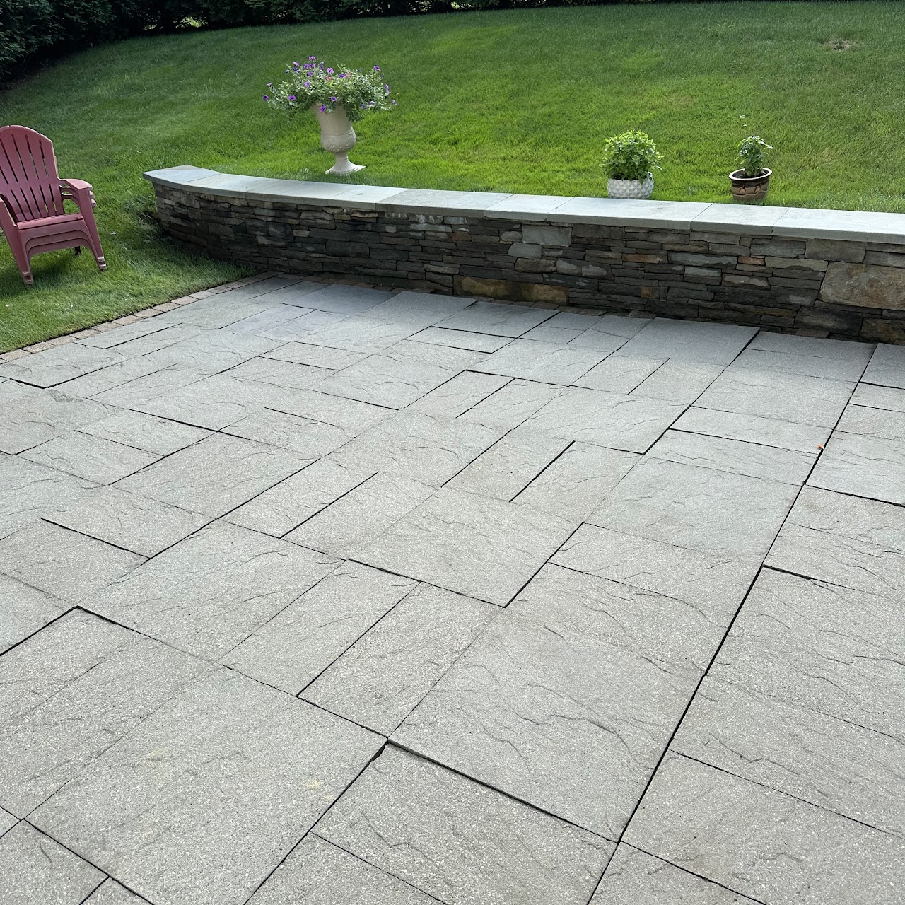 Pressure washed stone patio, clean and moss-free